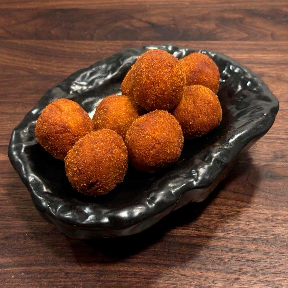Croquetas de berenjena y miel de caña